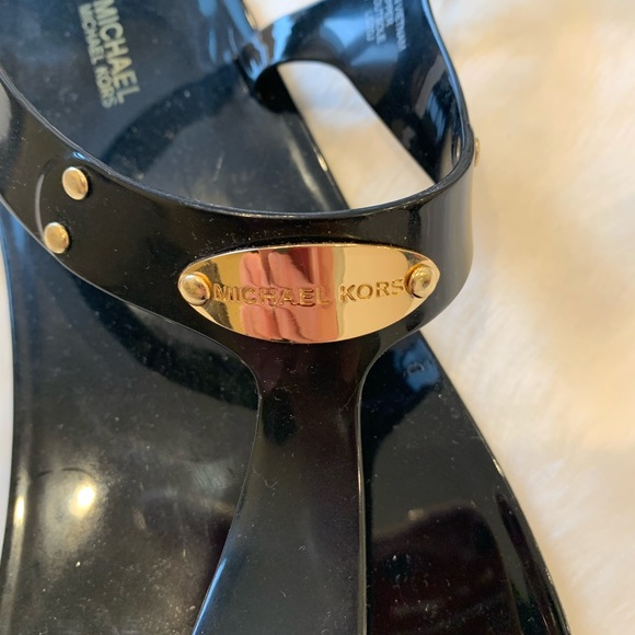 Black and gold Michael Kors thong sandals. - Picture 4 of 5